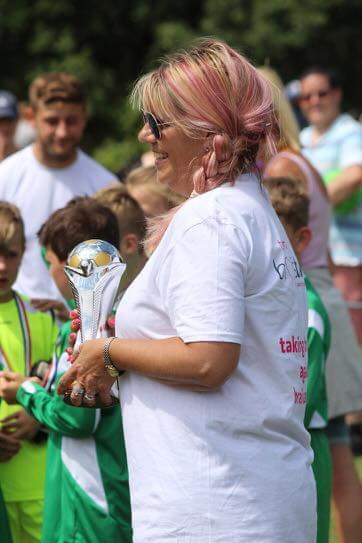 sharon presenting trophy